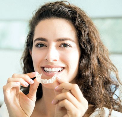 Life with Invisalign: What you need to know about caring for your aligners